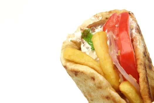 traditional greek food gyros kebap deatil with copy space isolated on white background