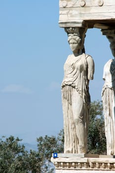 caryatid and nature at Erechtheum on Parthenon in Athens, Greece