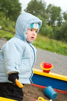 Boy Playing at the Playground