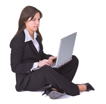 Young businesswoman working on  a laptop.