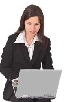 Young businesswoman working on a laptop-upper view.