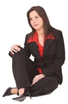 Beautiful young woman sitting on the floor.