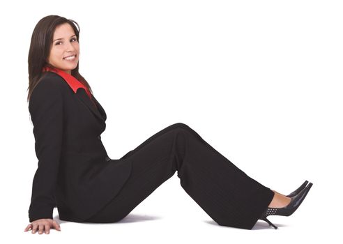 Young elegant woman sitting and smiling. 