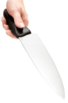 Female hand with a big kitchen knife. Isolated on a white background. Shallow depth of field.
