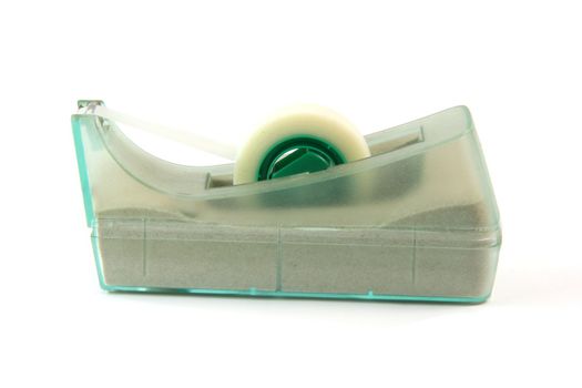 stationary items typical tape dispenser  isolated on white background