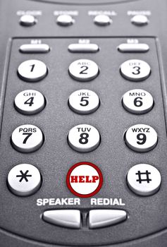 Keypad of a telephone with a red button for help