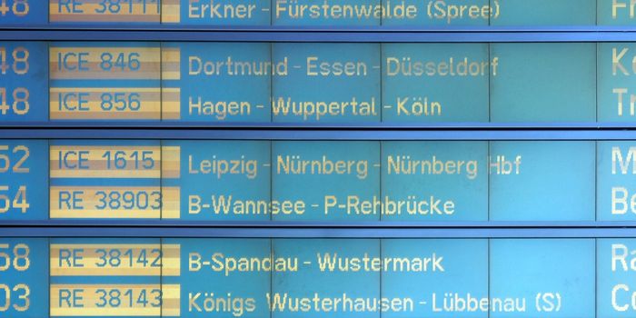 Detail of a train timetable at a station