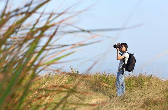 Photographer taking photo outdoor