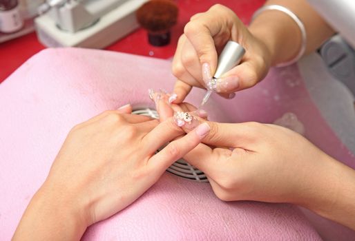 manicure process on female hand