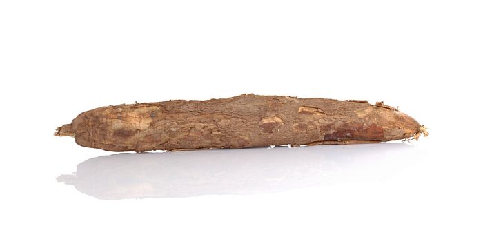 Raw cassava (lat. Manihot esculenta) on white