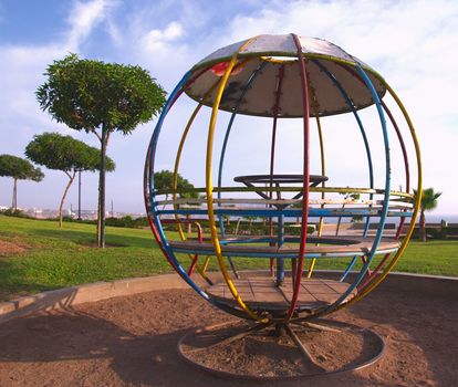 Round jungle gym in a park on the coast of Lima, Peru