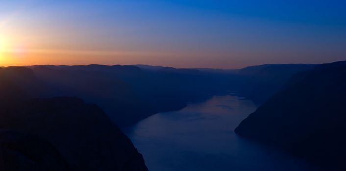 The Lysefjord, one of Norway's most famous fjords, at sunrise photographed from the Preikestolen