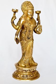 angled laxmi mata statue hindu demi god on a light background
