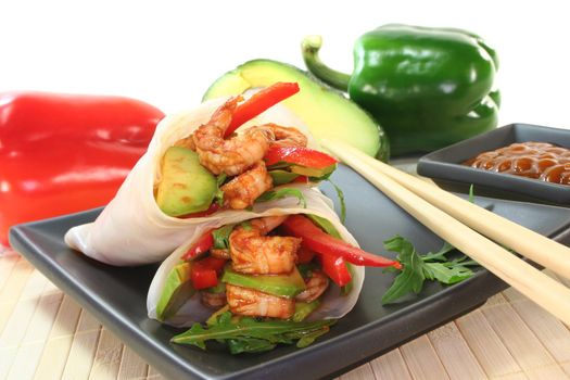 Asian Wrap with king prawns, avocado, red peppers and arugula