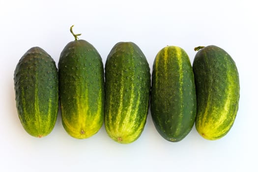 Fresh raw cucumbers isolated on white