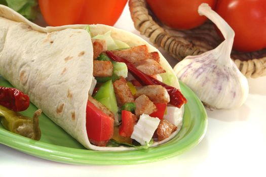Wrap with mixed vegetables, cheese and turkey strips
