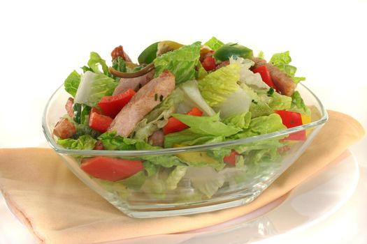 Mixed salad with turkey strips and fresh herbs