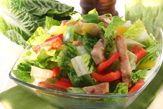 Mixed salad with turkey strips and fresh herbs