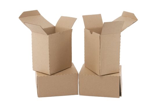 Brown cardboard boxes arranged in stack on white background