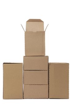 Brown cardboard boxes arranged in stack on white background