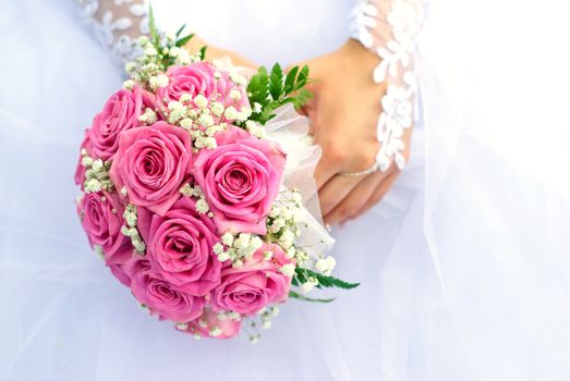 Bridal bouquet in the hand of bride