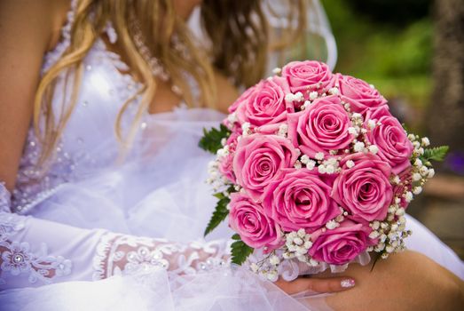 Bridal bouquet in the hand of bride