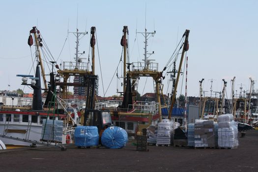 Fishing trawlers in the harbour in IJmuiden Holland