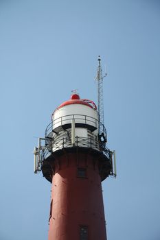 Old steel lighthouse near the harbour of IJmuiden, the Netherlands