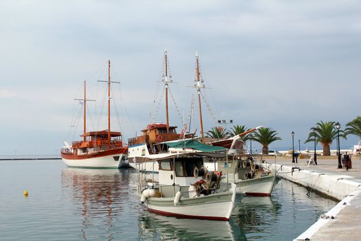 fishing boats and sailboats