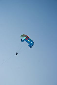 water sports under blue cloudless sky in goa india