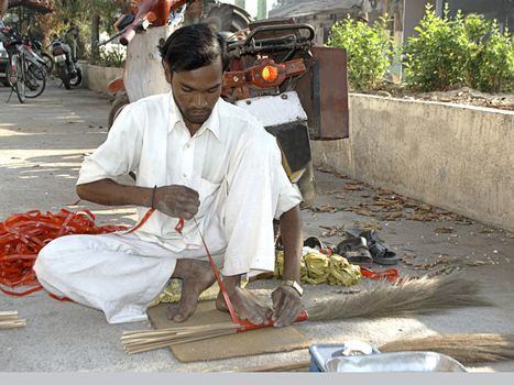 hand made sweeper brush jaaroo using hands and feet Gujarat village India