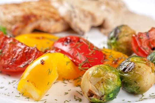 pork steak with mushroom sauce and grilled vegetables