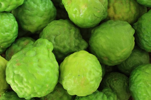 Background with pile kaffir limes