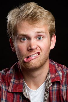 Young man making goofy face