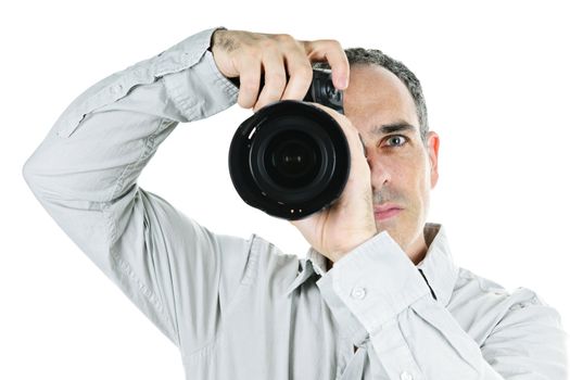 Portrait of male photographer with camera isolated on white background