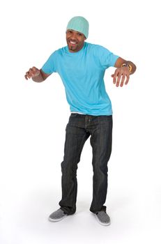 Funny guy in a blue t-shirt dancing, isolated on white background.