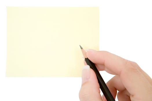 Female hand writing on a blank note. Isolated on a white background.