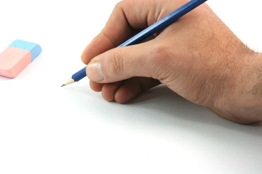 writting with black pencil closeup and eraser isolated on white background business concepts