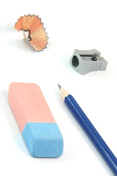 business and education concepts pencil eraser sharpener isolated on white background