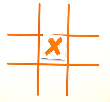 X marks the spot, even though this is a tic tac toe game. There's a concept in there somewhere.