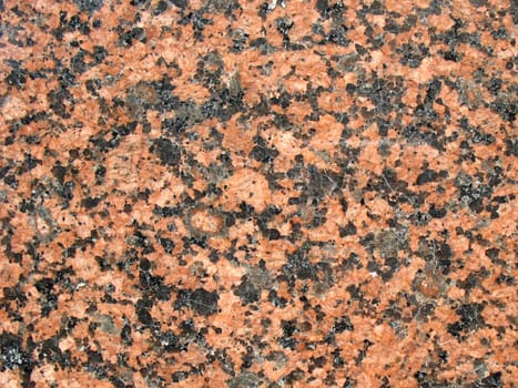 The smooth polished granite. Multi-coloured, the structure