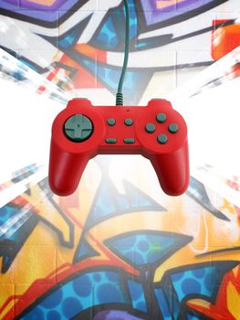 A red game controller over a graffiti background.  This file includes the clipping path for the controller.