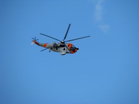 SAR helicopter in tight bank