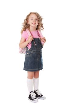 Beautiful girl with backpack happy and ready to go back to school, isolated.