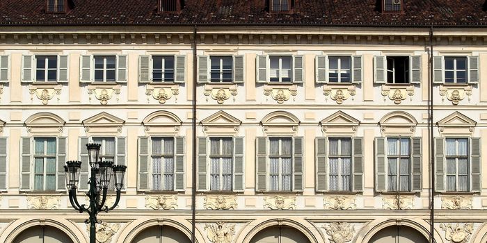 Typical traditional baroque facade of Turin (Piazza San Carlo)