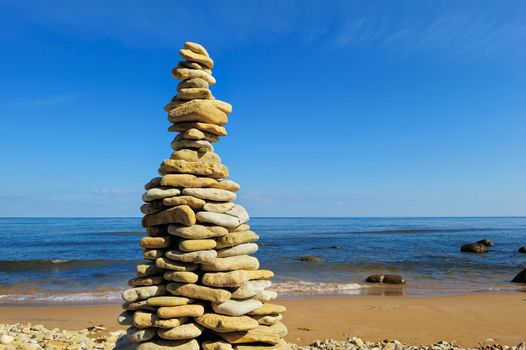 High pile of the cobblestones on the seacoast