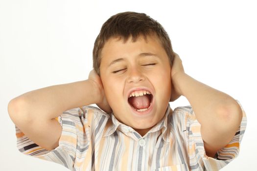 Portrait of screaming boy  over white