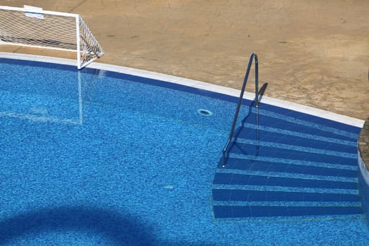 Swimming pool with stair at hotel