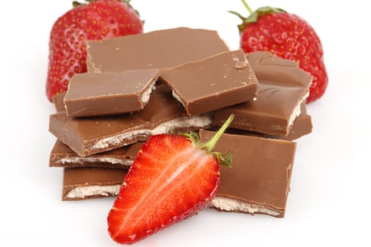 Close up of strawberry and chopped chocolate , shallow depth of field