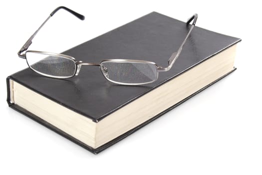 glasses and book, photo on the white background